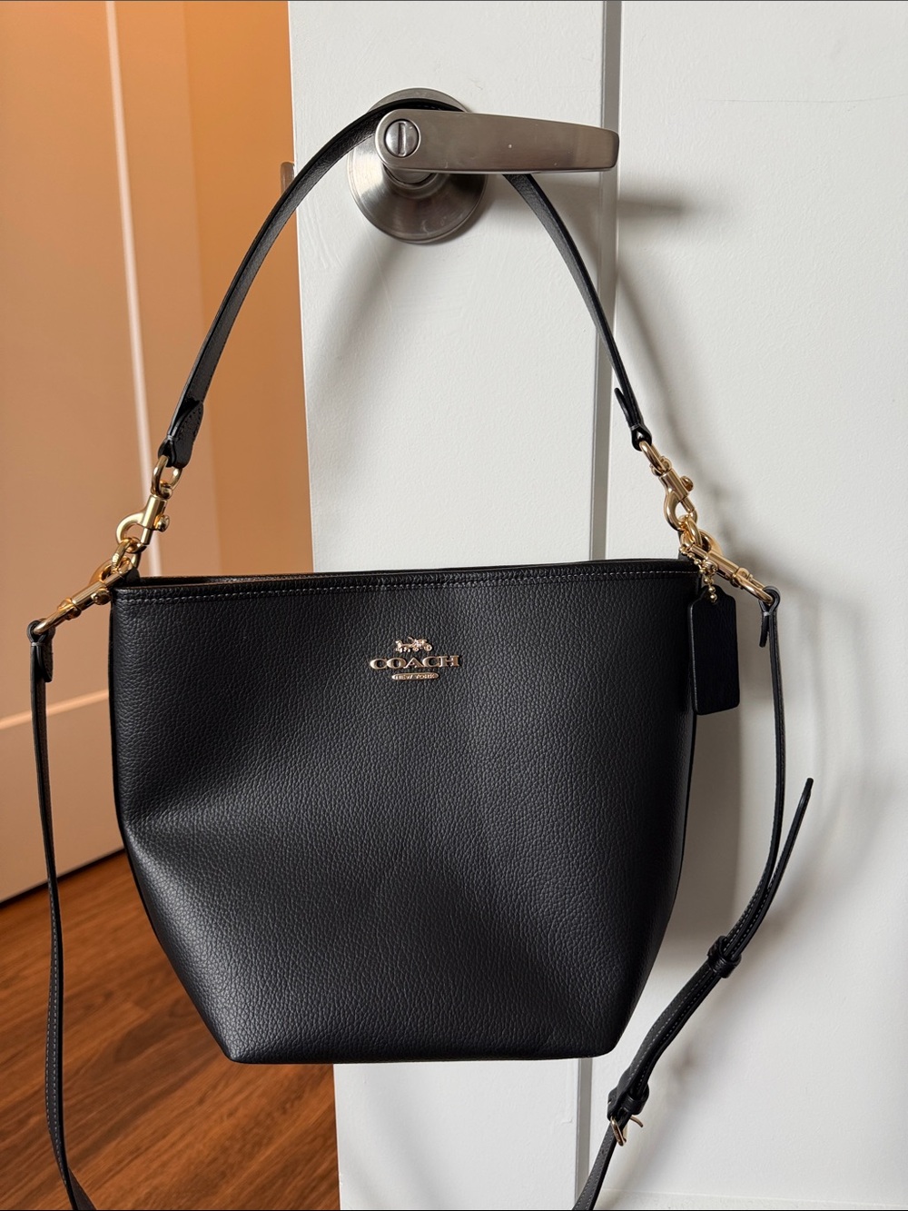Coach Black Pebble Leather Crossbody City Bucket Bag with Gold Hardware